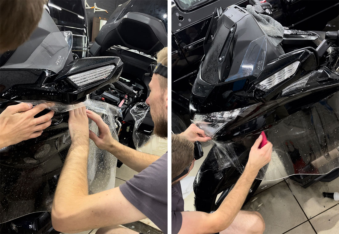 Смотреть на фото процесс оклейки полиуретановой пленкой мотоцикла Honda Gold Wing. 